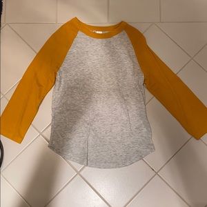 gray and yellow long sleeve shirt